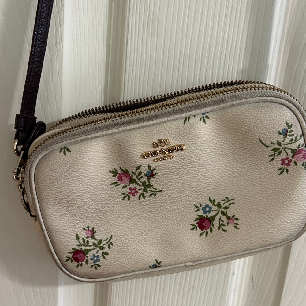 Coach Cream Floral Crossbody Bag 8”W by 5”across,